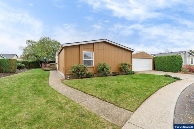 Well-maintained manufactured home located in the desirable