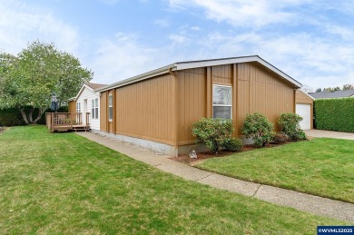 Well-maintained manufactured home located in the desirable