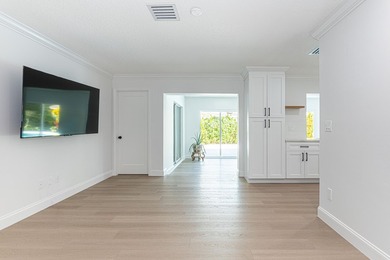 Tucked away on an oversized corner lot in the sought-after - photo 19