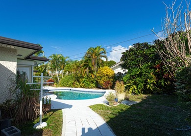 Tucked away on an oversized corner lot in the sought-after - photo 23