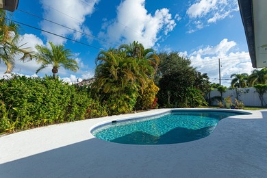 Tucked away on an oversized corner lot in the sought-after - photo 25