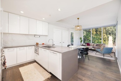 SW-facing 2 Bed in UBC's premier parkside community captures - photo 5