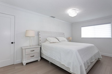 Tucked away on an oversized corner lot in the sought-after - photo 35