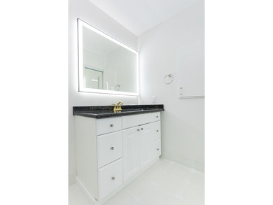 Tucked away on an oversized corner lot in the sought-after - photo 38