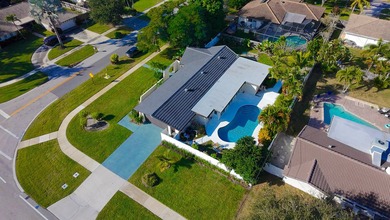 Tucked away on an oversized corner lot in the sought-after - photo 47