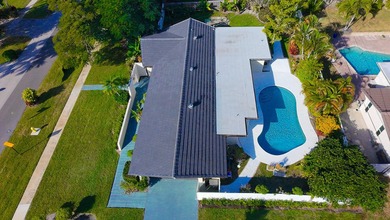 Tucked away on an oversized corner lot in the sought-after - photo 49
