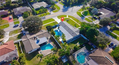 Tucked away on an oversized corner lot in the sought-after - photo 60
