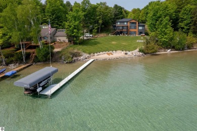 Lake Home For Sale in Kewadin, Michigan