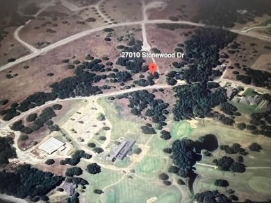 WOODED INTERIOR LOT IN BEAUTIFUL WHITE BLUFF RESORT RIGHT ACROSS - photo 2