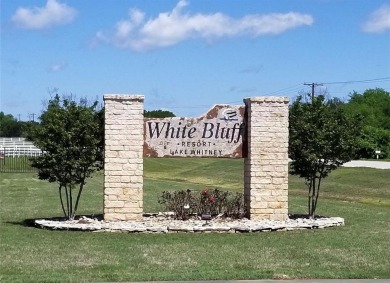 WOODED INTERIOR LOT IN BEAUTIFUL WHITE BLUFF RESORT RIGHT ACROSS - photo 7