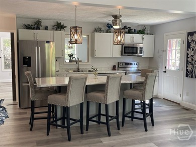 Welcome to your fully updated retreat in the highly sought-after - photo 24