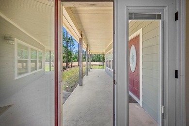 This charming 2-bedroom, 2-bath custom-built home sits on a - photo 23
