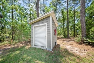 This charming 2-bedroom, 2-bath custom-built home sits on a - photo 30