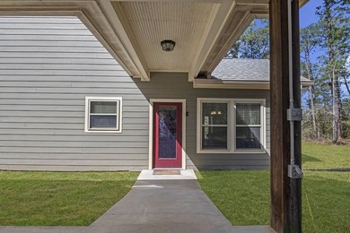 This charming 2-bedroom, 2-bath custom-built home sits on a - photo 32