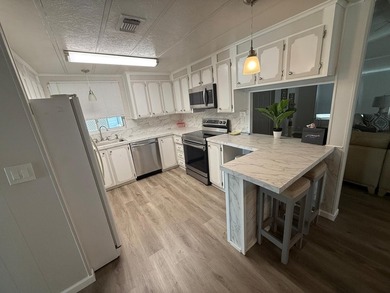 Stunning remodel in Sunny South Estates, 55+ Community, 2BR/2BA - photo 9