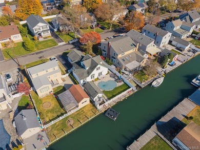 Experience life on the water in this beautifully updated - photo 1