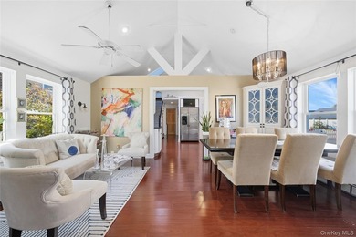 Experience life on the water in this beautifully updated - photo 5