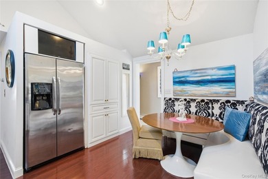 Experience life on the water in this beautifully updated - photo 9