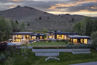 Sitting atop 2 combined elevated lots at the north end of - photo 1