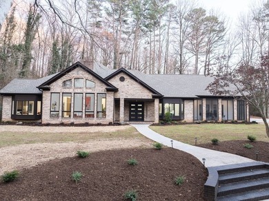 Discover this completely remodeled 5-bedroom, 4.5-bath home that - photo 2