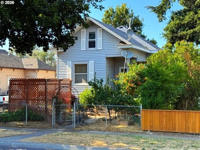 Opportunity awaits with this charming 1920s home, ideally