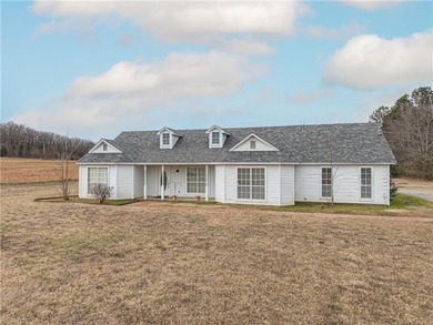 One-owner home on 5.12+- acres in Charleston, Arkansas. This