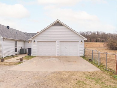 One-owner home on 5.12+- acres in Charleston, Arkansas. This