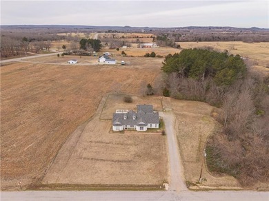 One-owner home on 5.12+- acres in Charleston, Arkansas. This