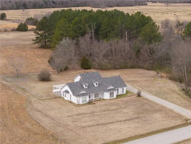 One-owner home on 5.12+- acres in Charleston, Arkansas. This