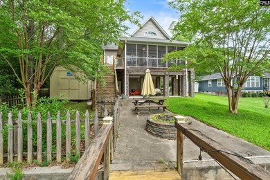 This 4 bedroom 3-1/2 bath two story home is tucked away on Lake - photo 1