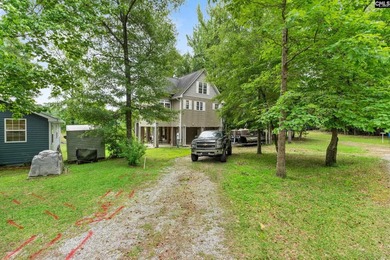 This 4 bedroom 3-1/2 bath two story home is tucked away on Lake - photo 2