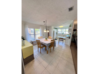 This meticulously maintained two-bedroom, two-bath home is - photo 7