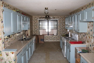 6,451 sf 3 bedroom, 3 bath home situated on 5.4 acres of land - photo 10