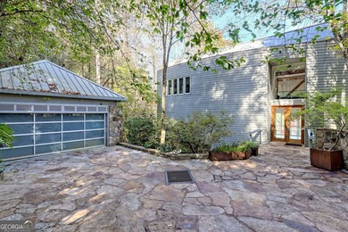 A FEE SIMPLE, 2.4+/- acre architectural masterpiece on the - photo 3