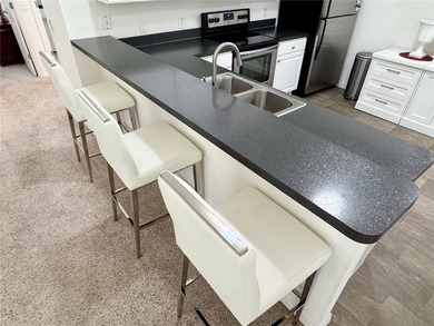 Welcome to this beautifully maintained Colony Patio Villa in the - photo 15