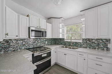 Completely remodeled and move in ready, this 4 bedroom, 2 - photo 17