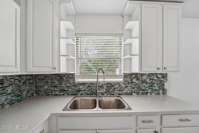 Completely remodeled and move in ready, this 4 bedroom, 2 - photo 18