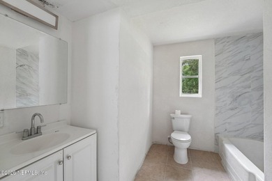 Completely remodeled and move in ready, this 4 bedroom, 2 - photo 24