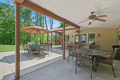 Tucked among the trees on 2 scenic acres just outside the - photo 50