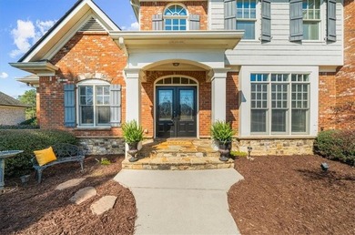 Set within the gated enclave of North Gate Manor, a sought-after - photo 4