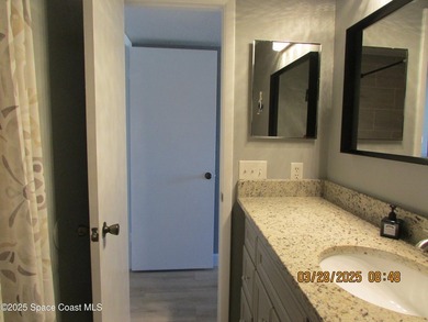 Experience beach-resort living at its finest in this updated - photo 14