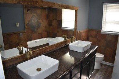 Well cared for, vinyl sided Lakefront home with 94' of frontage - photo 16