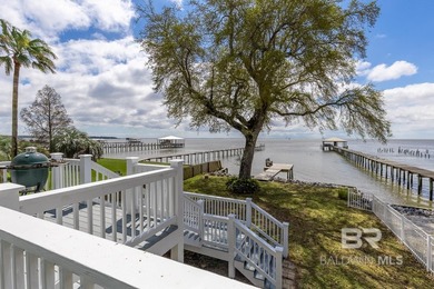 ENJOY BEAUTIFUL SUNSETS AND BAYFRONT LIVING EVERYDAY. This - photo 27
