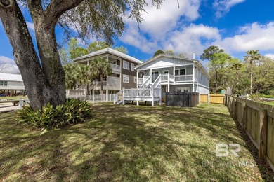 ENJOY BEAUTIFUL SUNSETS AND BAYFRONT LIVING EVERYDAY. This - photo 38