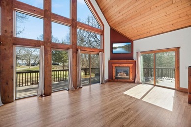 Tucked away on 6.6 wooded acres, this 3-bedroom, 2-bath home - photo 4