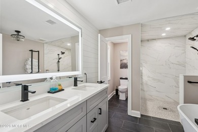 Experience luxury in this newly renovated, 5-bedroom, 3.5-bath - photo 10