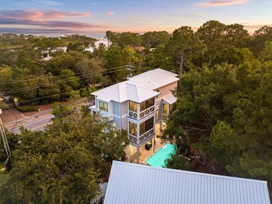 Completed in 2023, this stunning three-story beach house is - photo 11