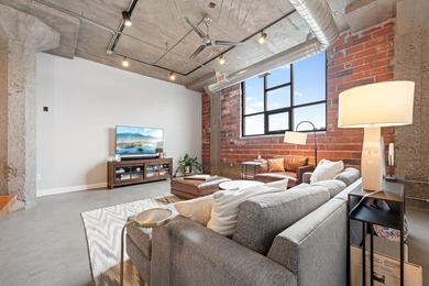 Loft-style living in the North Loop, done right! This oversized - photo 11