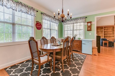 This exquisite home in the prestigious Windmill Plantation