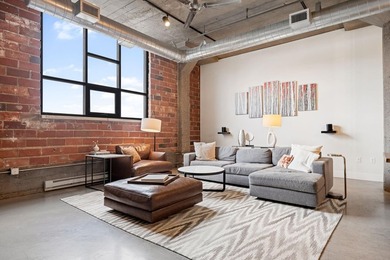 Loft-style living in the North Loop, done right! This oversized - photo 12